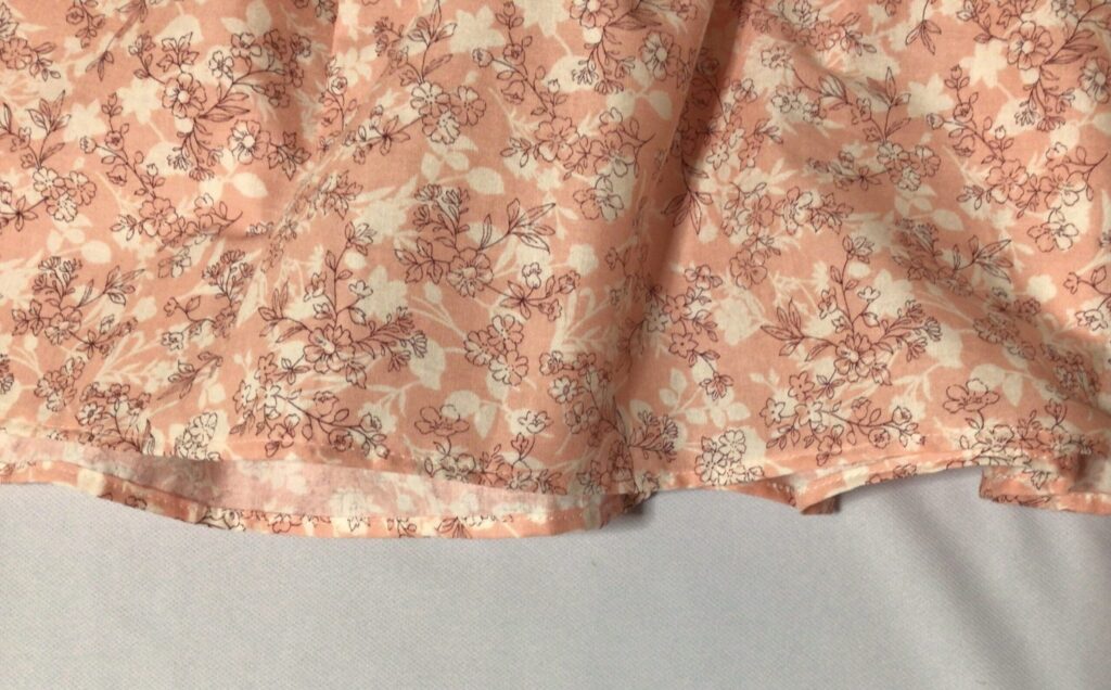 裾